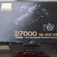 دوربین نیکون D7000 با لنز 105-18 و جعبه