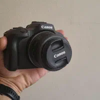 Canon R100 با لنز کیت