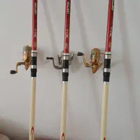 سه عدد چوب و چرخ ماهیگیری