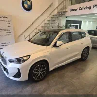 معاوضه بی ام وه ix1  با کیت M داخل مشکی مدل ۲۰۲۵