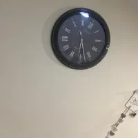 ساعت دیواری طوسی