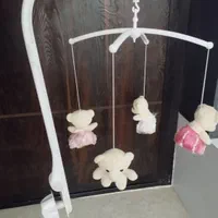گهواره بچه همراه آویز تخت موزیکالی