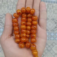 تسبیح کهربا رگه دار