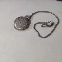 ساعت کنده کاری شده