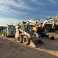 مینی بیل مکانیکی بابکت مینی لودرکمپرسی حمل نخاله