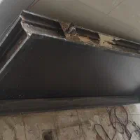 چهارچوب فلزی به همراه درب چوبی