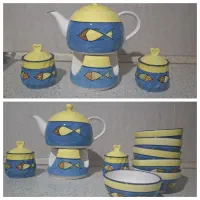 وسایل پذیرایی قوری وارمر و پیاله و قند دان