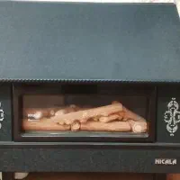 بخاری گازی شومینه دار نیک کالا 30هزار