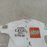 لباس آستین کوتاه . دکمه دار . سفید