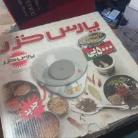 ترازوی دیجیتال و آب میوه گیری مرکبات