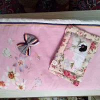 سرویس آشپزخانه. نمگیر ودستگیره‌های رنگارنگ نخی