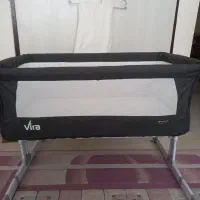 تخت کنار مادر و ننو کودک با روروک مجانی