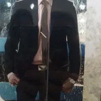 کت شلوار مردانه|لباس|رباط‌کریم, رباط‌کریم|دیوار