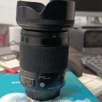 لنز دوربین عکاسی کانن. 18 300 sjgma