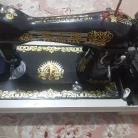 چرخ خیاطی مرد پرنده