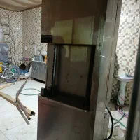 یک عدد کبابگیر اتوماتیک ویک عدد منقل ریلی