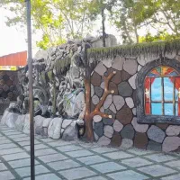 نمای باغ و ویلا الاچیق ابنما طرح سنگ و چوب