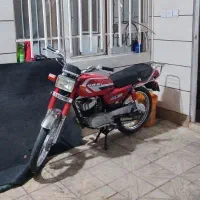 سوزوکی ax100
