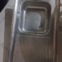 زیر تلوزیون و سینک ظرف شویی