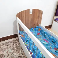 تخت گهواره ای کودک|تخت و صندلی بچه|دوگنبدان, |دیوار