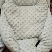 پتو پیچ و آغوش بچه