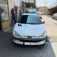 پژو 206 sd مدل ۹۰ برگه کارشناسی داخل عکس