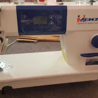 چرخ خیاطی مارک منزو و اتو بخار سرمی سیلور