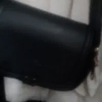 یک بسته که داخل آن سه پوشه مدارک قولنامه بوده از