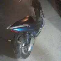 یک عدد متور برقی کامل سالم با باتری نو