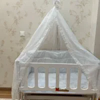 تخت(گهواره) کنار مادر