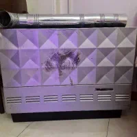 بخاری گازی به همراه لوله بخاری