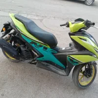 کیلیک آیلوکس|موتورسیکلت|نی‌ریز, |دیوار