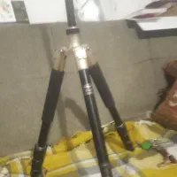 سه پایه دوربین تراز دار