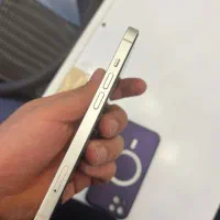 ایفون ۱۳ سفید به همراه اداپتور و کابل