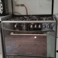 اجاق گاز .قاب چوبی و پشتی