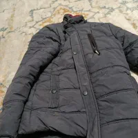 یک عدد کاپشن سالم نو