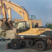 بیل مکانیکی هیوندا لاستیکی210