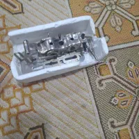 جادکمه زن چرخ خیاطی