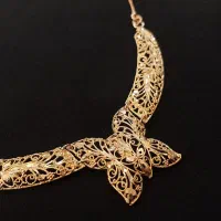 گردنبند و گوشواره طلا بدون اجرت در حد نو