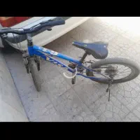 دوچرخه کت شلوار سرخ کن