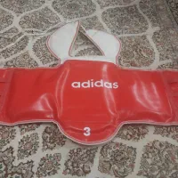 هوگو و تجهیزات تکواندو اصل آدیداس