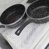 ماهیتابه تفلون ۳تیکه و قابلمه های روحی ۴تیکه