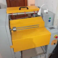 دستگاه رول کن خانگی سفره یکبار مصرف