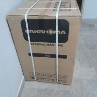 ماشین لباسشوئی رنگ نقره ای