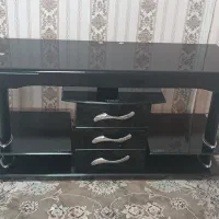 میز تلویزیون بزرگ شیشه ای کشودار