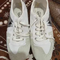 کفش فوتبال و کارگری