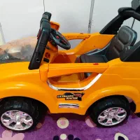 ماشین شارژی پر قدرت با کنترل و شارژ .موزیکال