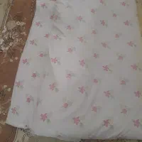 تعدادی پتو تشک بالش