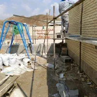 اجرای نمای ساختمان آجر سنگ رومی