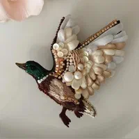 آموزش گلدوزی،جواهردوزی و تزئین لباس مزونی